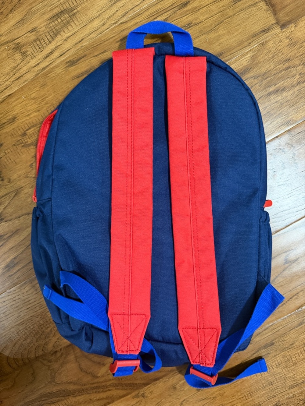 EUC Boden Navy Backpack with Bright Red Interior - Picture 4 of 4